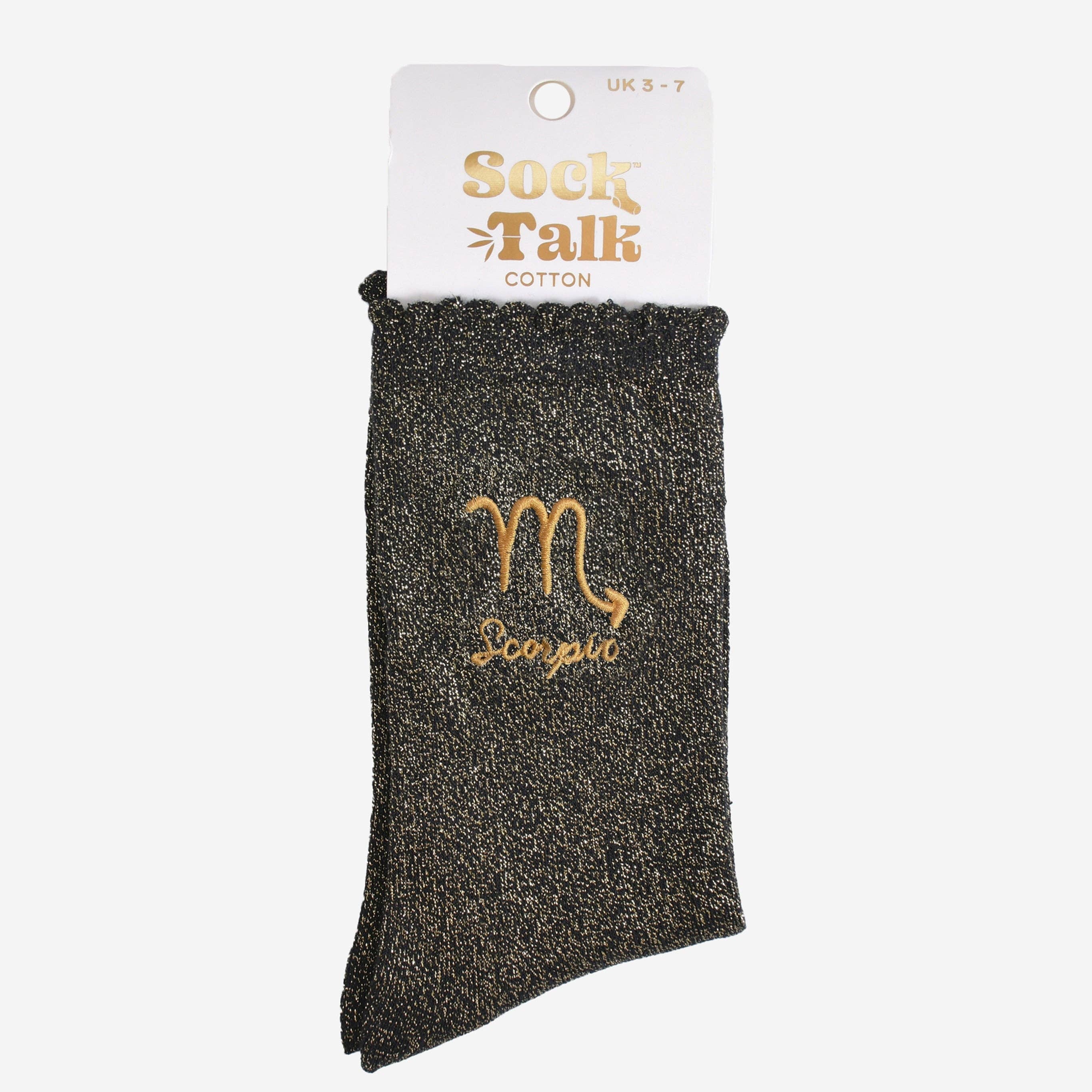 Black glittery sock with 'Scorpio' text on a white background, branded 'Sock Talk'.