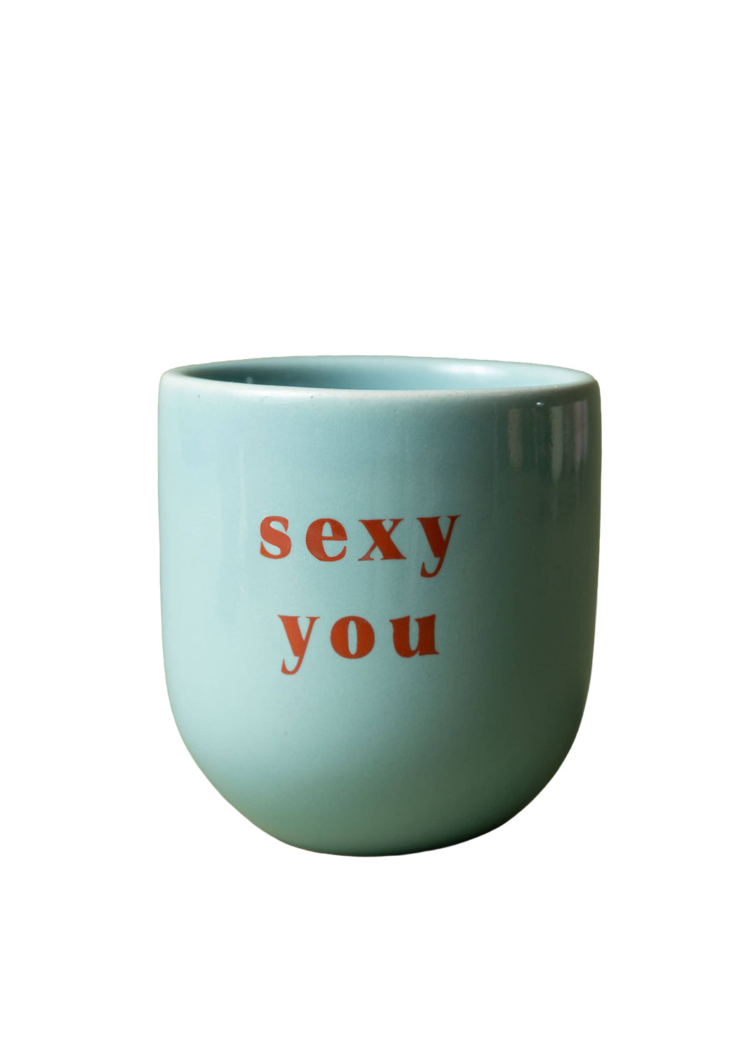 Light blue mug with red text 'sexy you' on a white background