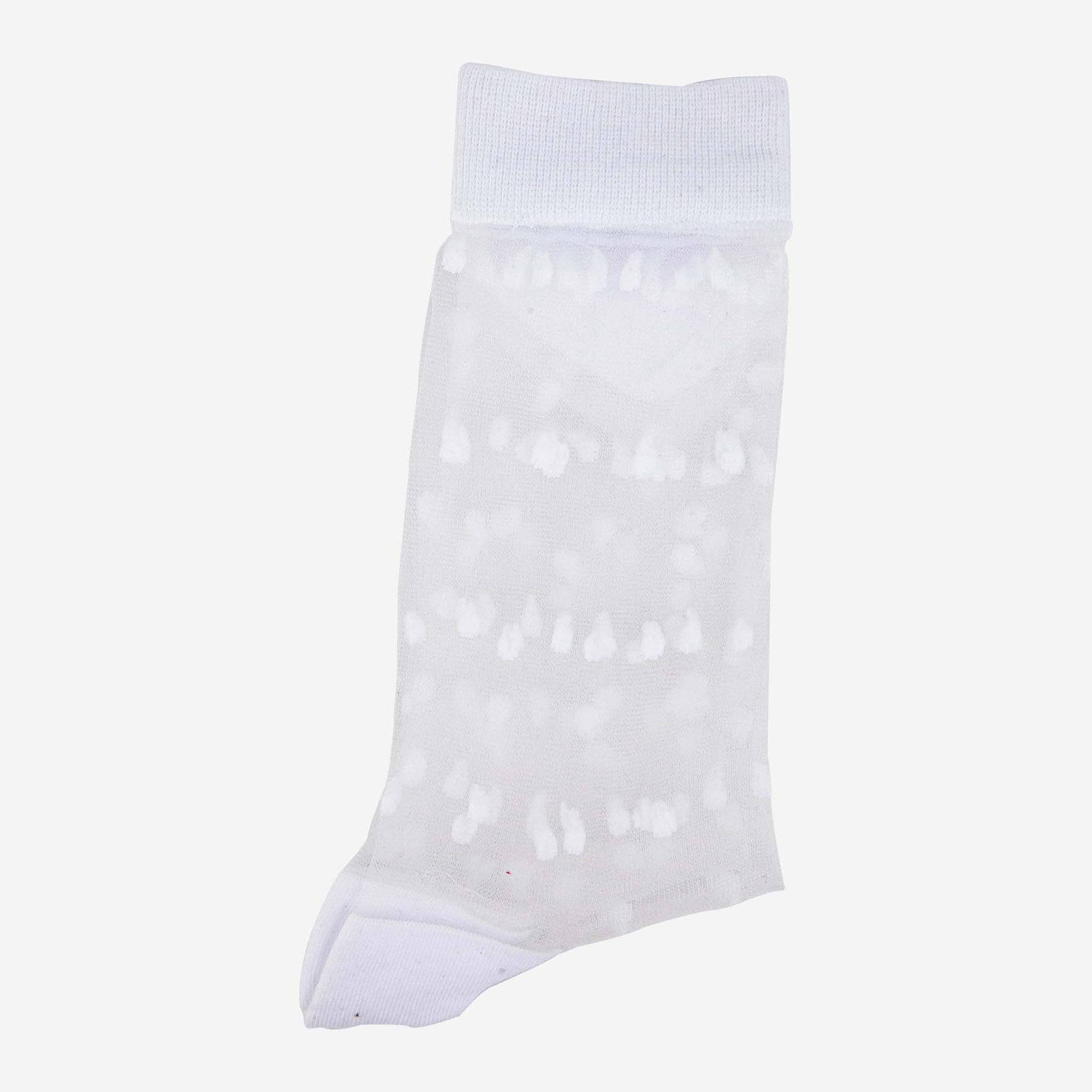 White sock with small black patterns on a light gray background