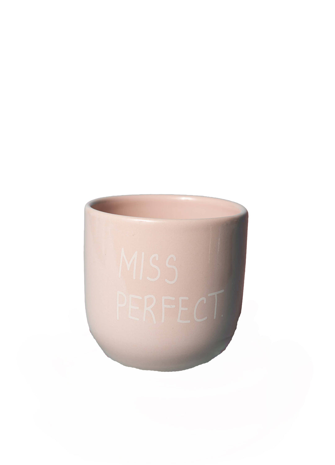 Pink ceramic mug with 'MISS PERFECT' text on a white background