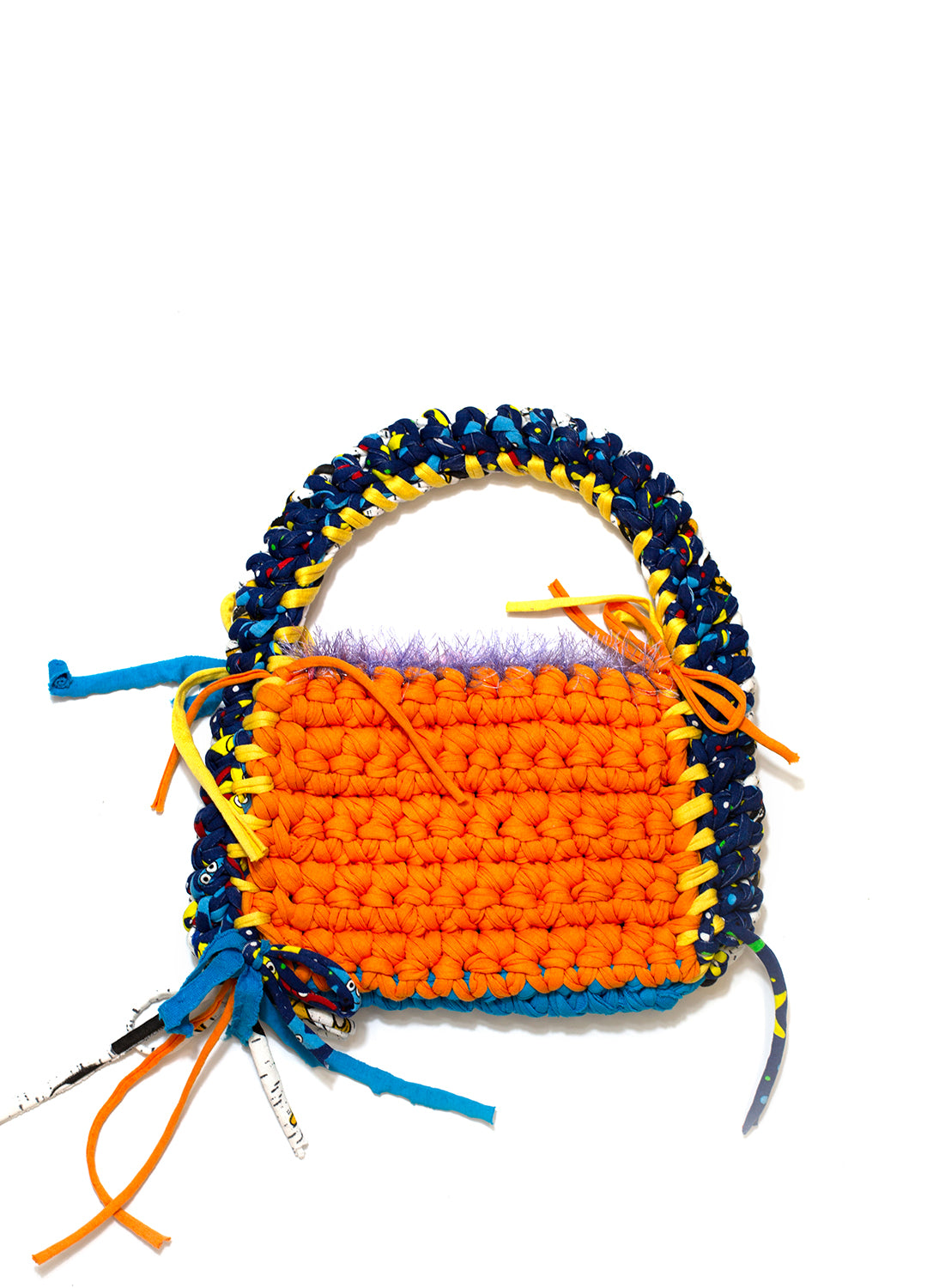 the orange blue and yellow delilah bag by sloe mosey on a white backdrop