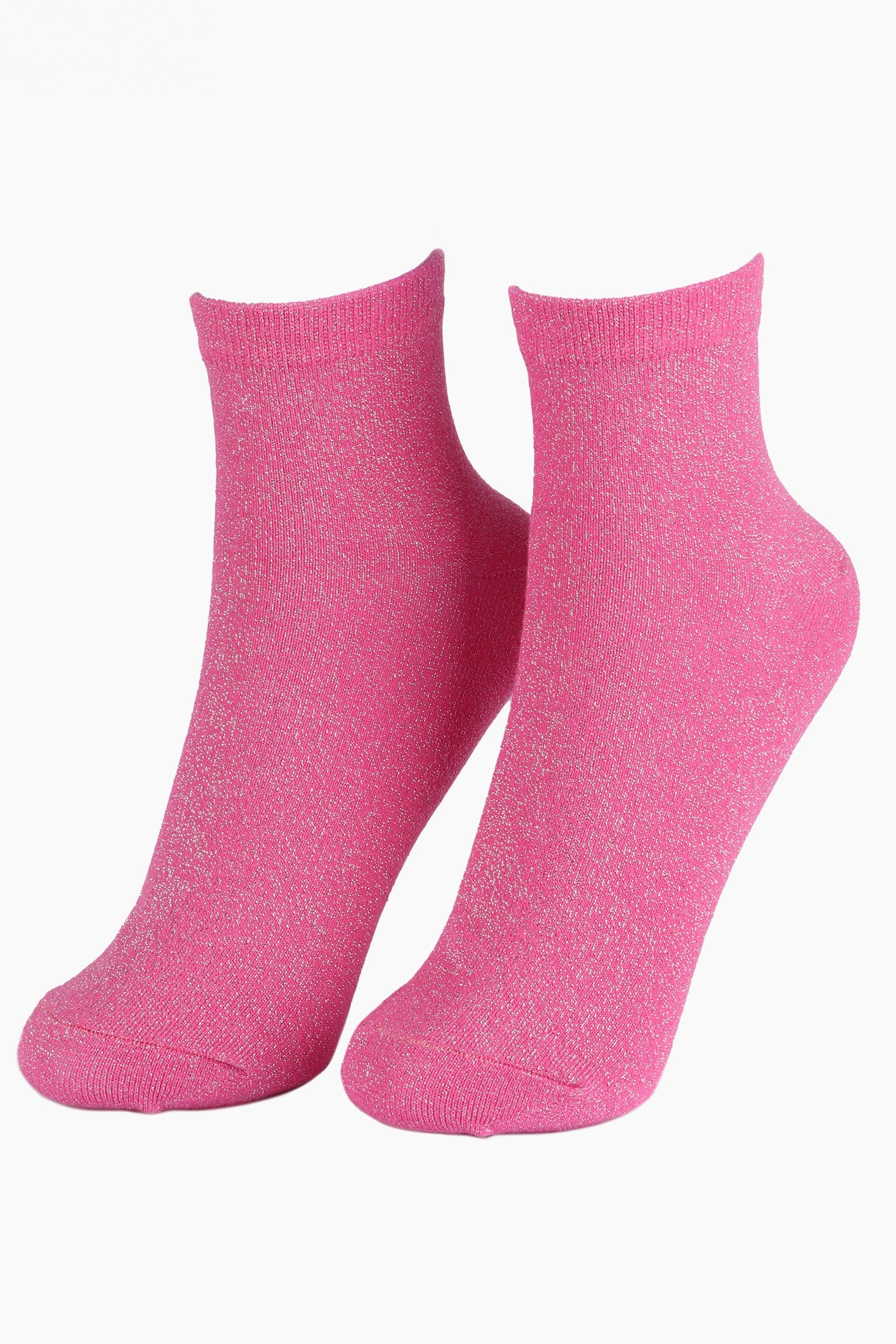 Pair of pink socks on a white background