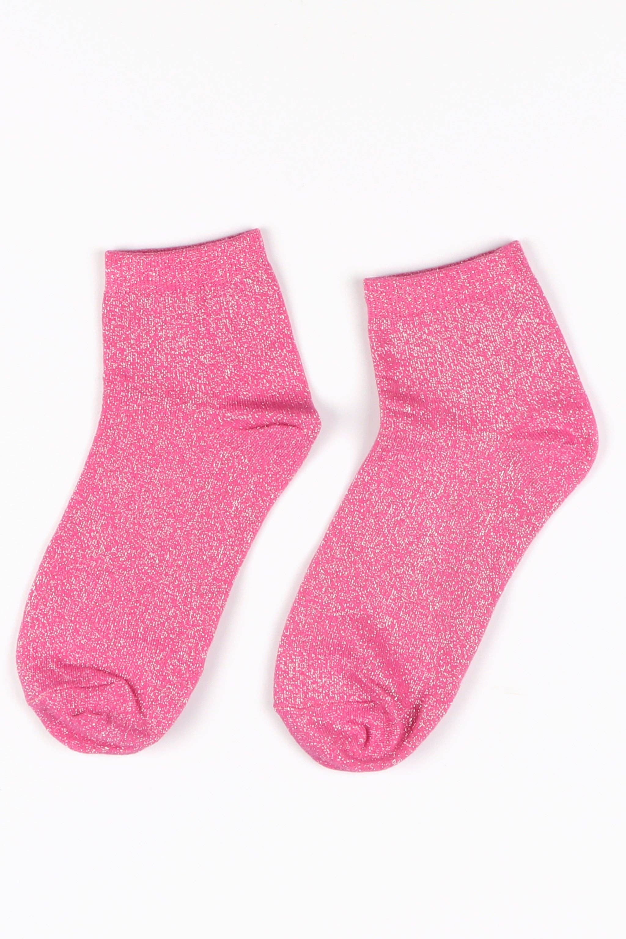Pair of pink socks with a subtle shimmer pattern on a white background