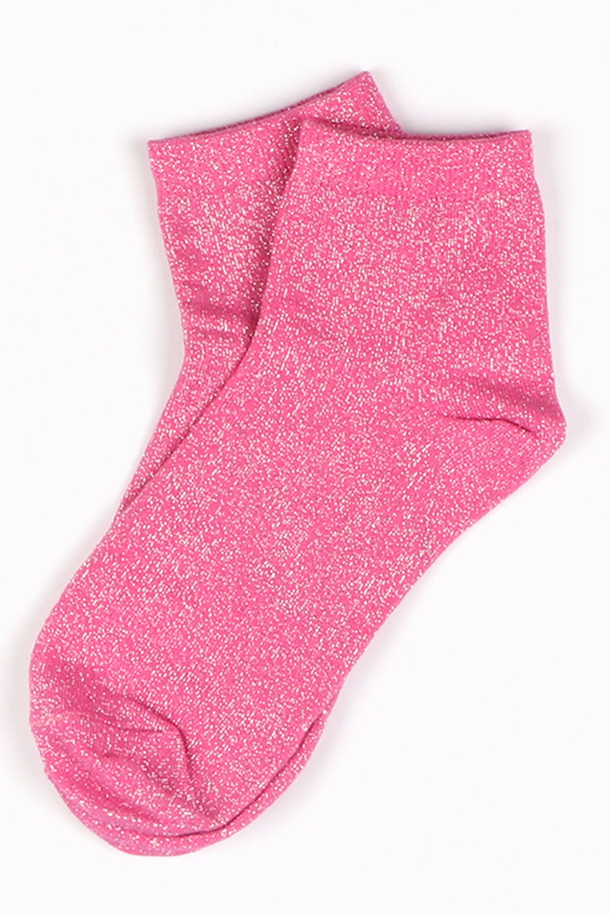 Pink glittery sock on a white background
