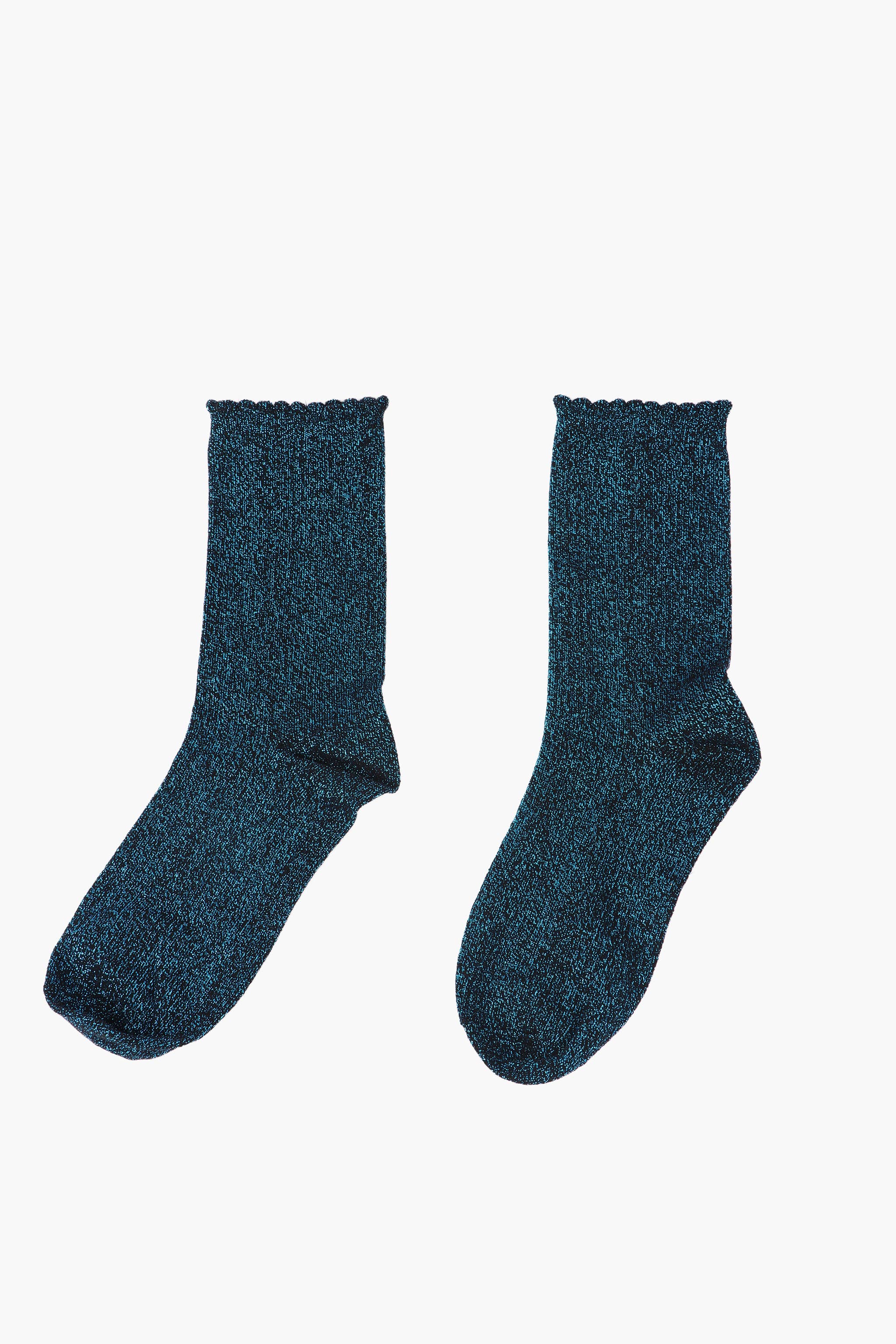 Pair of dark blue socks on a white background