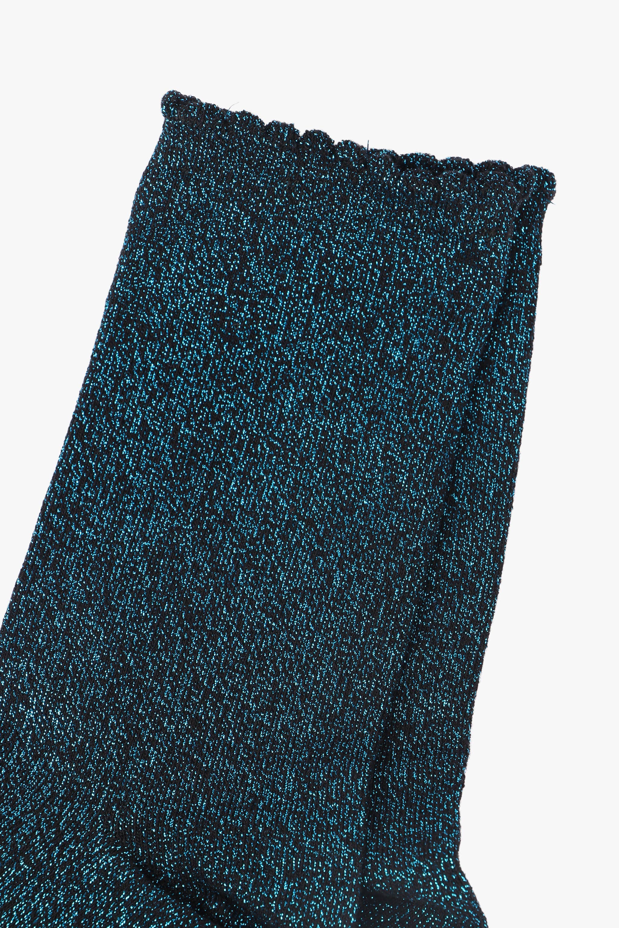 Dark blue textured sock on a white background